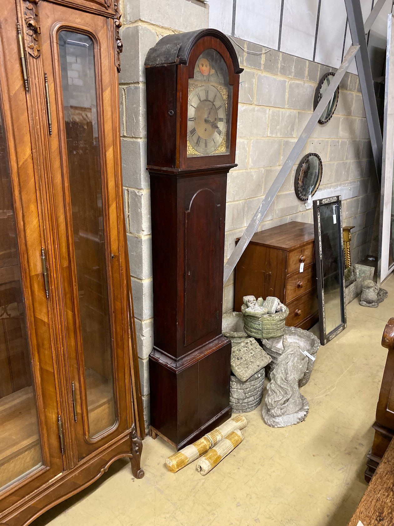 An early 19th century mahogany musical eight day longcase clock striking on eight bells, height 203cm